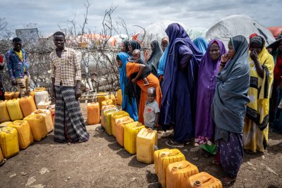 Somalis displaced by drought and war wait for water at the Sebedow Camp, as they set up in more than 500 camps supported by the United Nations and relief agencies. Photo: Scott Peterson/Getty Images